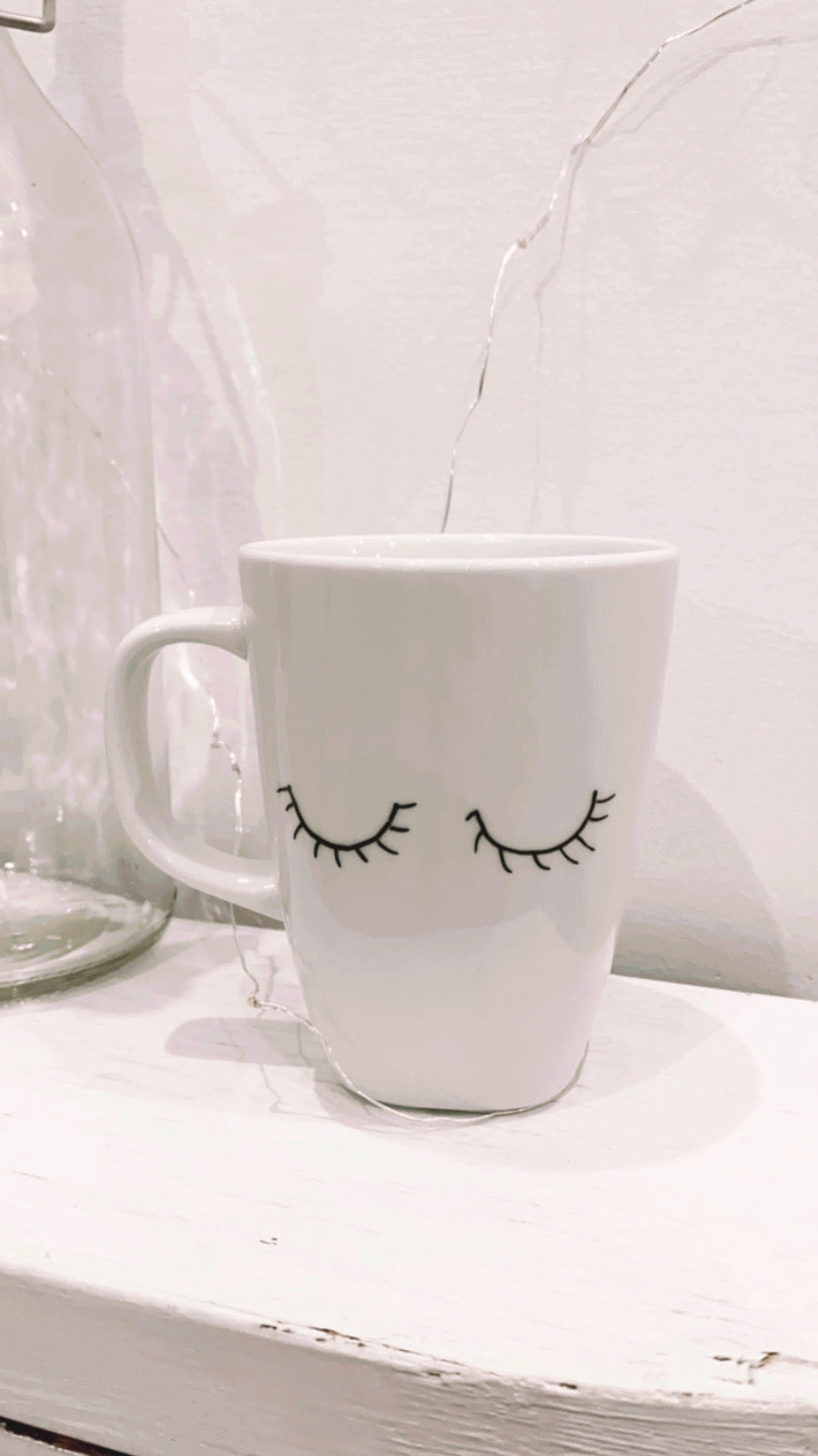 Tazza con disegno occhi